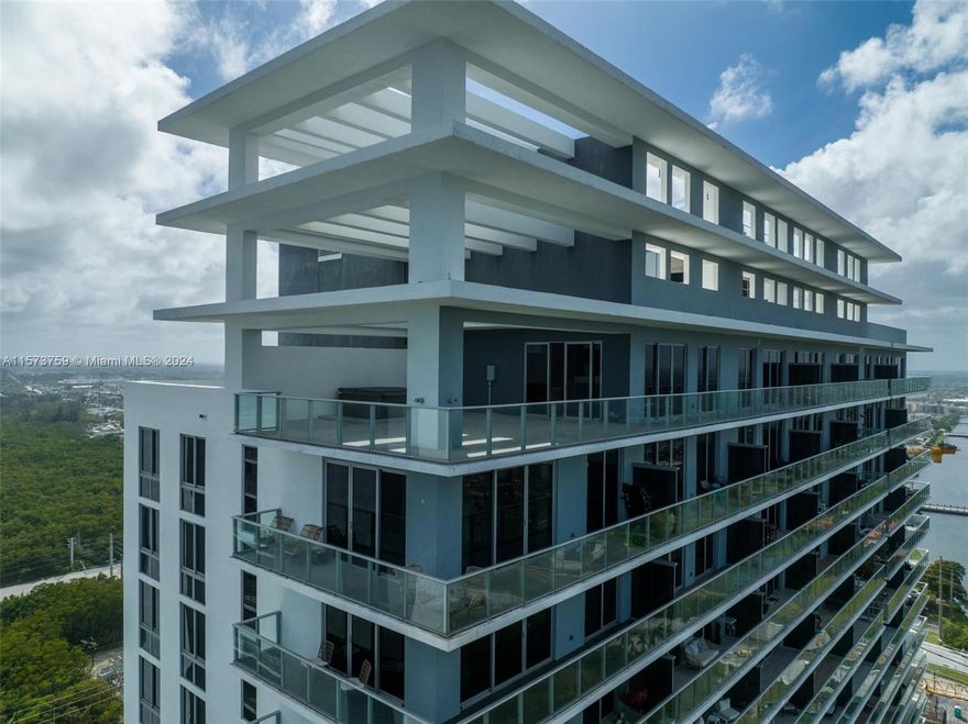This Penthouse's Gem can be yours if you take action ASAP wont last!!! best price on the market for this house on the sky with private elevator which opens up into this gorgeous 2,279sqft under AC and 1,529sqft of wrap around balcony this endless 180 degrees of Breath taking ocean & intercostal views, with porcelain floors, open kitchen state of the art appliances, 24hr Valet & Security, exclusive concierge, dry cleaning and laundry services, a fun filed kid-friendly areas: arcade room, outdoor water play zone and Playground. Tennis, Soccer, Basketball, Racquetball, large BBQ and gathering area, fenced dog park, Fitness Center, Open studio for yoga, exercise room, Spa, hot and cold hydrotherapy plunge pools, steam/sauna, restaurant, serenity trail with Vita Course fitness stations winding