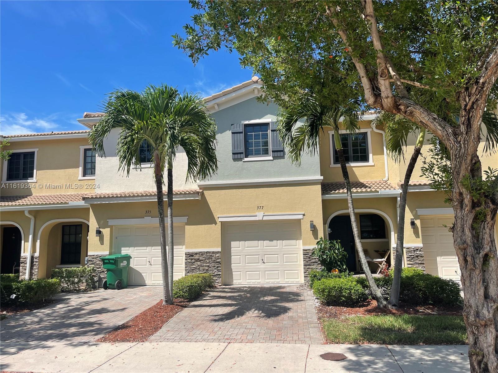 NEW LISTING !MAGNIFICENT 3 BDR / 2.5 BATH TOWNHOUSE FOR SALE IN THE CHARMING PRIVATE COMMUNITY OF AVENTURA ISLES. THIS TOWNHOUSE IS FULLY RENOVATED WITH ULTRA MODERN FEATURES: ELECTRIC CURTAINS, WHITE CERAMIC FLOORS THROUGHOUT, WHITE KITCHEN WITH ALL TOP OF THE LINE APPLIANCES,, ELECTRIC CURTAINS, ELECTRIC FIREPLACE WITH LIGHT EFFECTS, LAUNDRY WITH WASHER AND DRYER IN THE UNIT, A PRIVATE SECURED GARAGE ,TWO PARKING SPACES IN FRONT AND A LARGE PRIVATE PATIO WITH TABLE AND UMBRELLA. IN A CHARMING PRIVATE GUARDED COMMUNITY, FEATURING A COMMUNITY POOL, CLUBHOUSE AND CHARMING GREEN SPACES WITH LAKES NEAR PLACES OF WORSHIP. DONT MISS THIS INCREDIBLE OPPORTUNITY, CLOSE TO AVENTURA MALL, EASY ACCESS TO THE FREEWAY AND MINUTES FROM THE FAMOUS AVENTURA MALL AND THE BEACH !!!!!