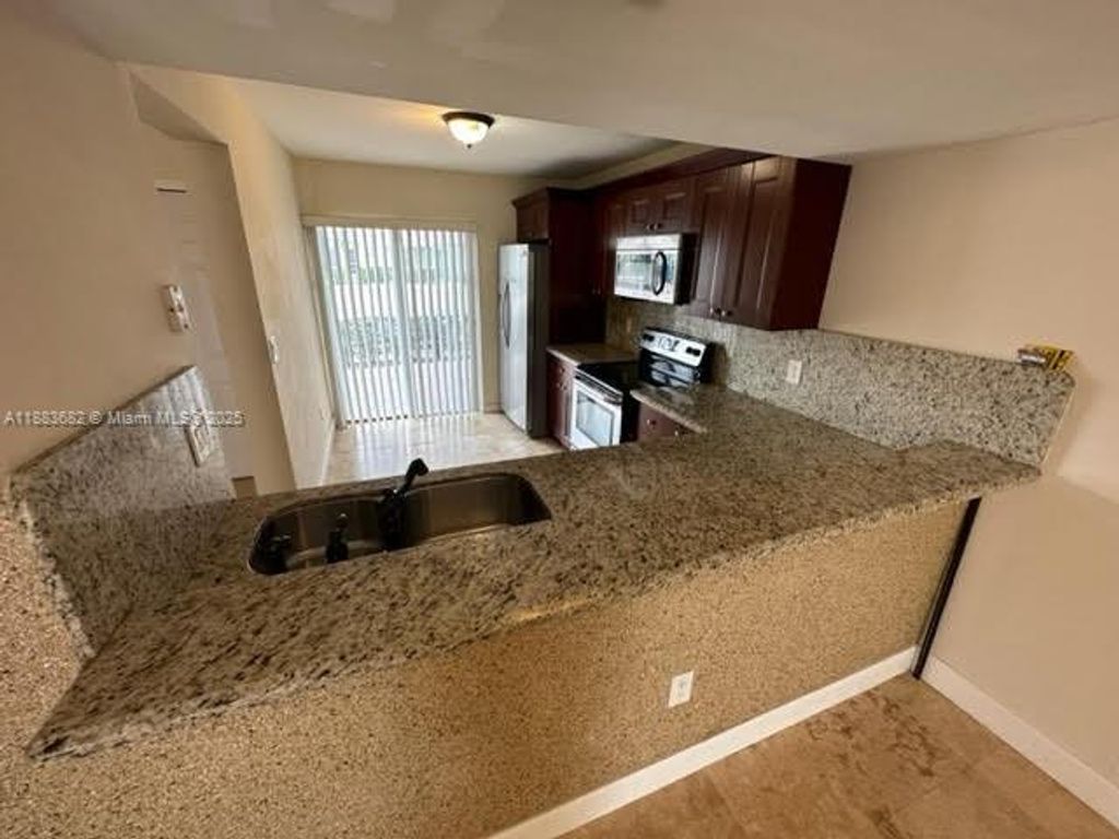 Photo of 878 Crystal Lake Dr #878, Deerfield Beach, FL 33064 (MLS # A11883682)