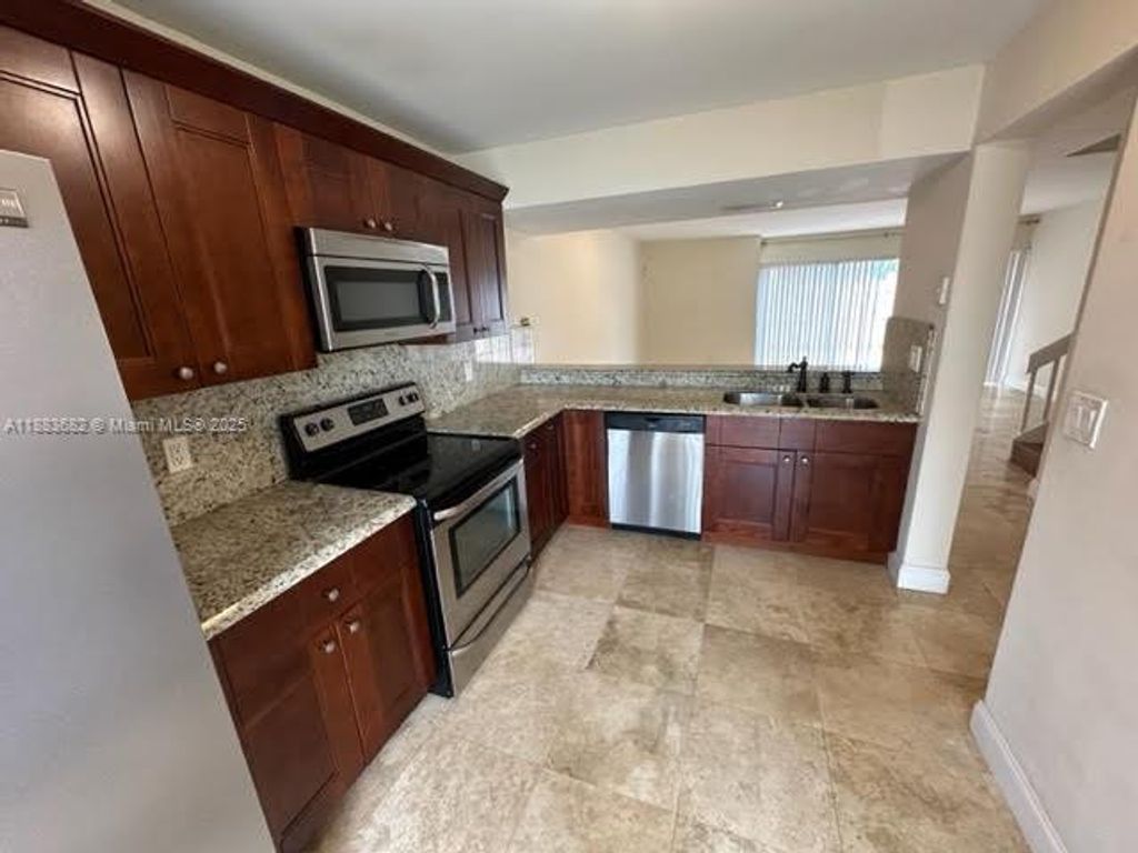 Photo of 878 Crystal Lake Dr #878, Deerfield Beach, FL 33064 (MLS # A11883682)