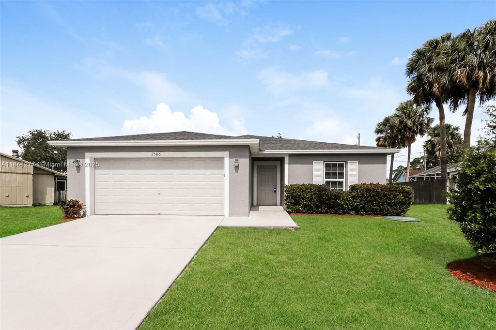 Photo of 2586 SW Dawn St, Port St Lucie, FL 34953 (MLS # A11844277)