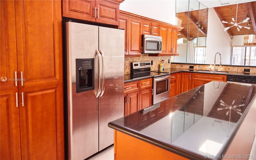 A PARADISE! 3/2 VILLA LOCATED IN THE HEART OF THREE ISLANDS HALLANDALE. MODERN BRIGHT VILLA WITH SKYLIGHTS THROUGHOUT, PORCELAIN TILE FLOORS. STAINLESS-STEEL APPLIANCES. WASHER AND DRYER INSIDE UNIT.
HOUSE INCLUDED 28-FOOT DEEDED BOAT DOCK. NO FIXES BRIDES. HUGE PATIO. 
RESORT STYLE. CLUBHOUSE, SAUNA, Pool. BEST LOCATION IN THE HEART OF HALLANDALE. WALKING DISTANCE TO OCEAN