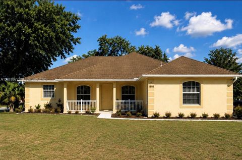 Photo of 7608 Deland Ave, Fort Pierce, FL 34951 (MLS # A12018077)