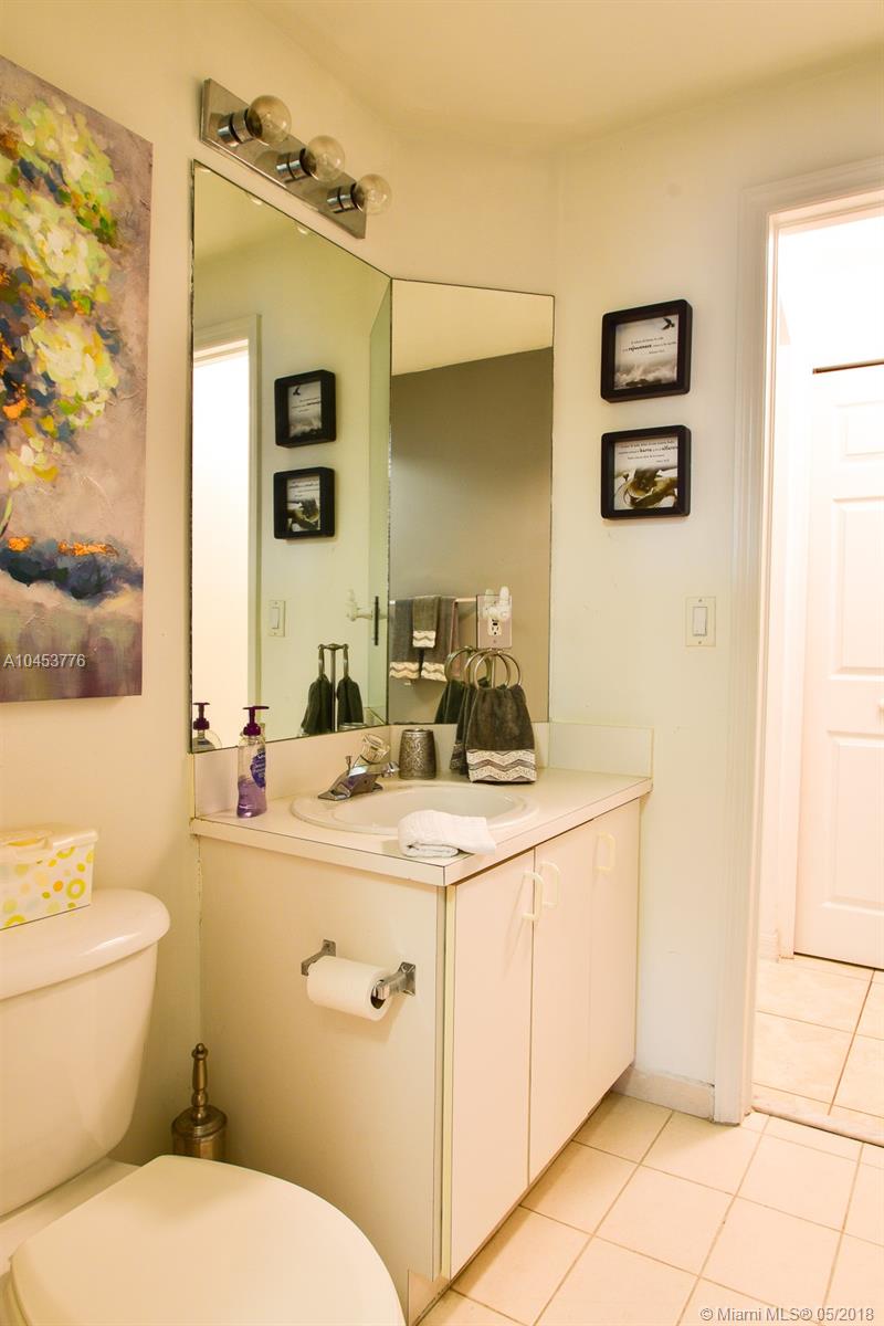 THE COURTS AT DORAL ISLES - Residential Lease