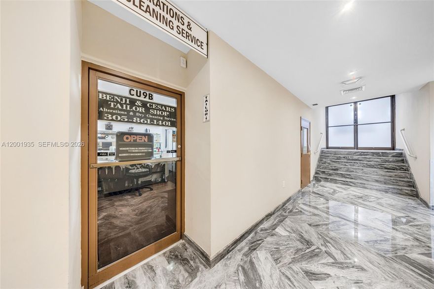 Located in the heart of Miami Beach’s "Millionaire’s Row," 5401 Collins Avenue, Suite CU9, is a 3,200-square-foot multi-level commercial asset within the Carriage House. Commercially zoned for office and retail use, the space is uniquely positioned to serve an affluent residential corridor and benefits from a direct oceanfront orientation. The majority of the interior has been fully remodeled, minimizing immediate capital expenditure for a new owner and ensuring the space meets modern professional standards. Currently stabilized with a bespoke tailor and an upstairs office, the unit provides immediate cash flow alongside six dedicated parking spaces—a high-value rarity in this submarket that significantly enhances tenant retention and long-term valuation. This turn-key investment combines a prestigious waterfront location with full access to resort-style building amenities and a high-density, captive customer base.