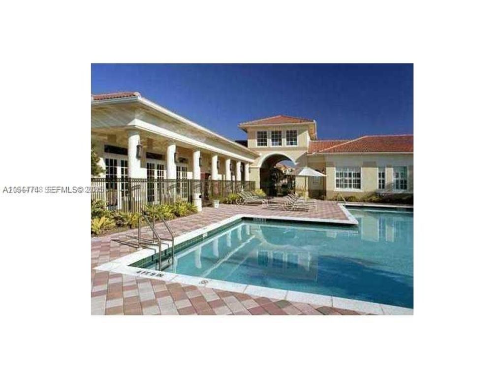 Photo of 2548 Centergate Dr #203, Miramar, FL 33025 (MLS # A11944768)