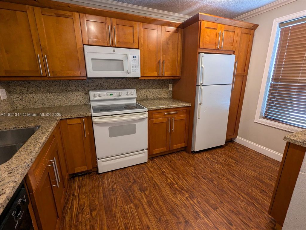 Photo of 8009 SW 21st Ct #8009, Miramar, FL 33025 (MLS # A11821314)