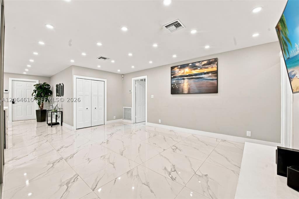 Photo of 821 Ramblewood Dr #821, Coral Springs, FL 33071 (MLS # A12064610)
