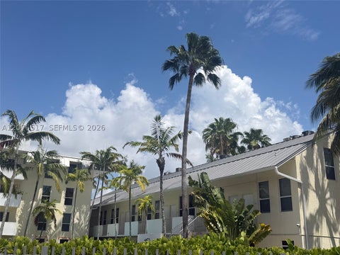 Photo of 8950 SW 69th Ct #220, Pinecrest, FL 33156 (MLS # A12076517)