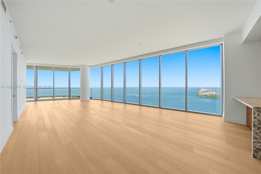 Experience elevated waterfront living at UNA Residences in this brand-new 4-bedroom, 3.5-bath residence on the 31st floor. This thoughtfully designed home features a private elevator entry, expansive floor plan, and floor-to-ceiling glass that frames stunning southeast views over Biscayne Bay, including Coconut Grove and the open water.

The residence showcases wood flooring, a fully equipped kitchen with Gaggenau appliances, and generous living spaces that seamlessly connect to a spacious terrace. The layout offers both functionality and privacy, ideal for modern living.

Additional features include two assigned parking spaces and dual air conditioning systems for enhanced comfort.

UNA Residences is a newly completed, architecturally distinctive waterfront tower offering a curated lifestyle with resort-style amenities, including 2 pools, a fitness center, and a spa. Ideally located in Brickell with convenient access to Coconut Grove, Downtown Miami, Key Biscayne, and Miami International Airport. 

***Furniture Images are virtually staged.