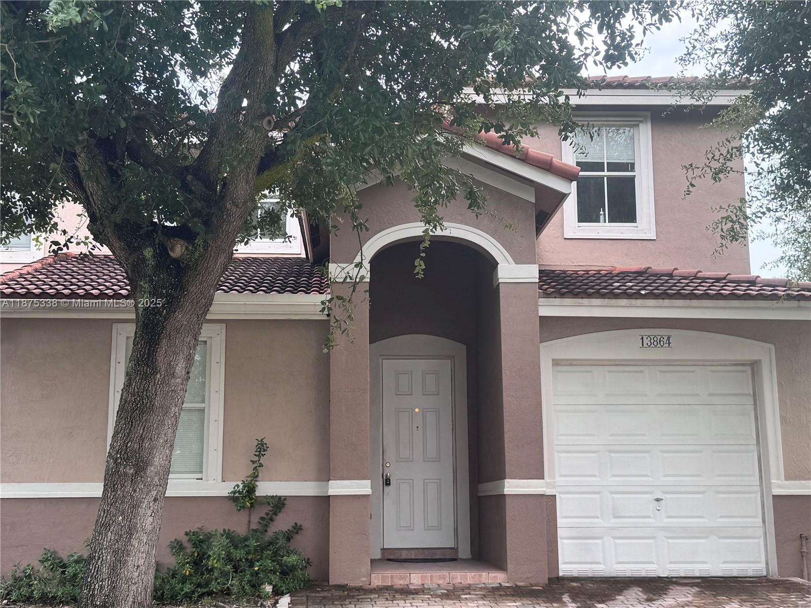 Discover your perfect home in this inviting townhome located in a serene, gated community right off the Turnpike. This spacious 4-bedroom oasis boasts a generous that enhances the interior layout, providing ample room for both relaxation and entertainment. Step inside to find beautiful laminate flooring in the bedrooms and stylish tile throughout the living areas, creating a warm and inviting atmosphere. With several updates to the bathrooms and kitchen, you'll appreciate the modern touches that make this home truly special. Freshly painted and with new flooring just installed, Enjoy outdoor living in your private fenced patio, perfect for morning coffee or evening gatherings.