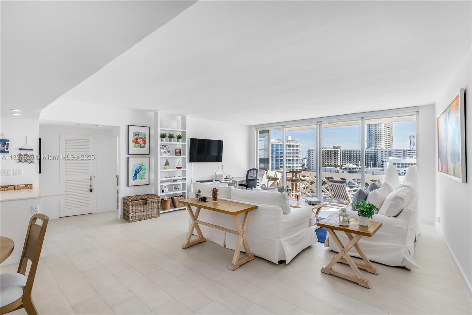 Bright and spacious furnioshed 2 bedroom apartment with unobstructed water views in Belle Plaza! Only split plan unit per floor plan. Completely renovated with a semi open kitchen. Impact windows and sliding door. Enjoy sunrises and sunsets from every room in this gorgeous apartment. Laundry room in the hallway. Easy to show.