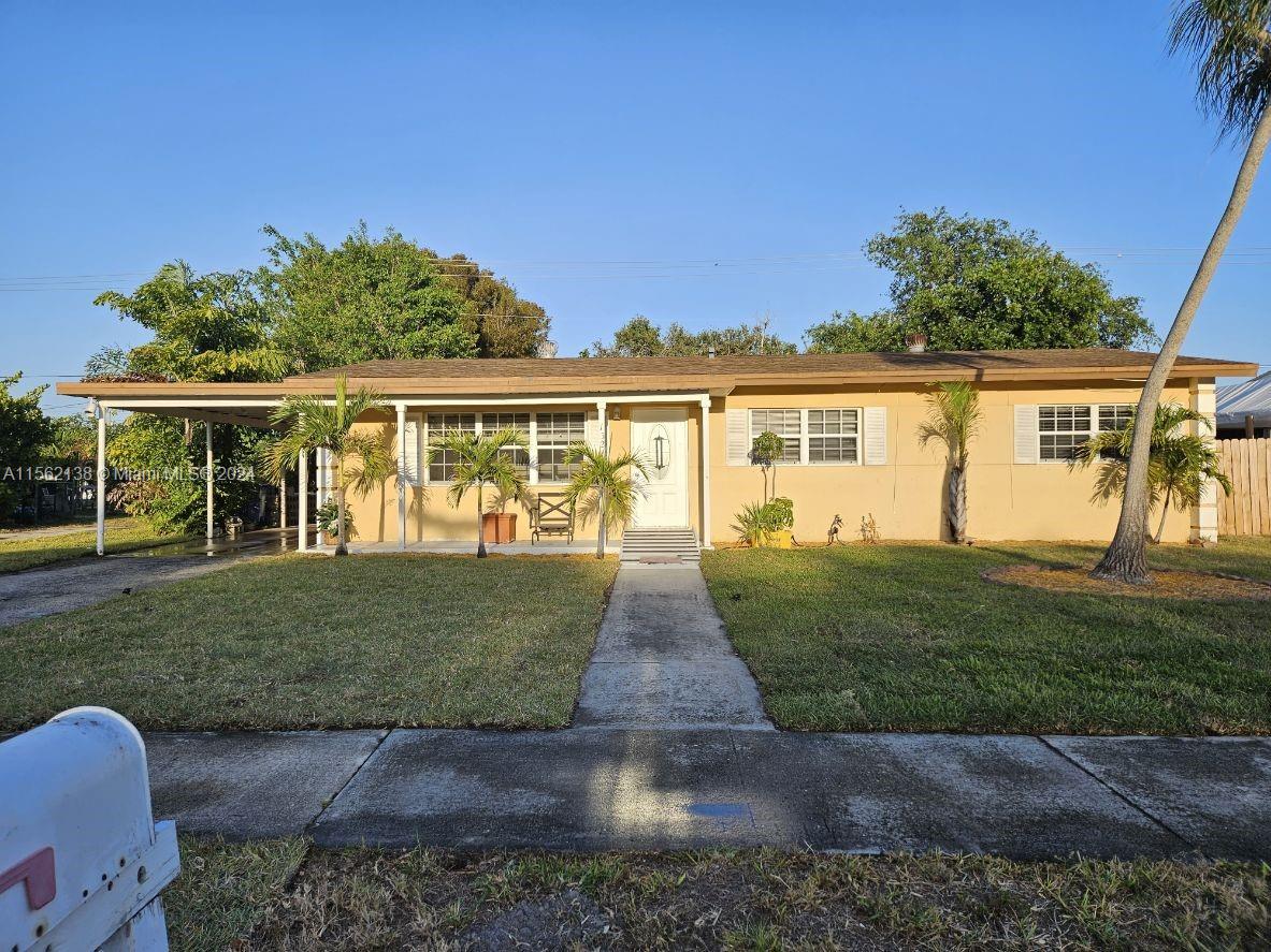 Lovely bright and light one story single family home with 3 bed, 2 bath and upgraded kitchen with SS appliances. Home has tile throughout and vinyl flooring in the bedrooms. Full size washer and dryer. Fenced in yard for the pets and an attached carport. Beach is very close. No HOA approval, quick move in.