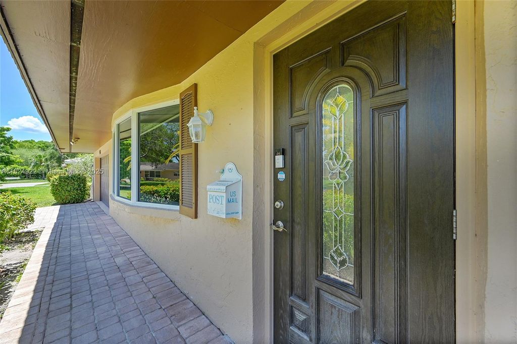 Photo of 8301 NW 37th St, Coral Springs, FL 33065 (MLS # A11824922)