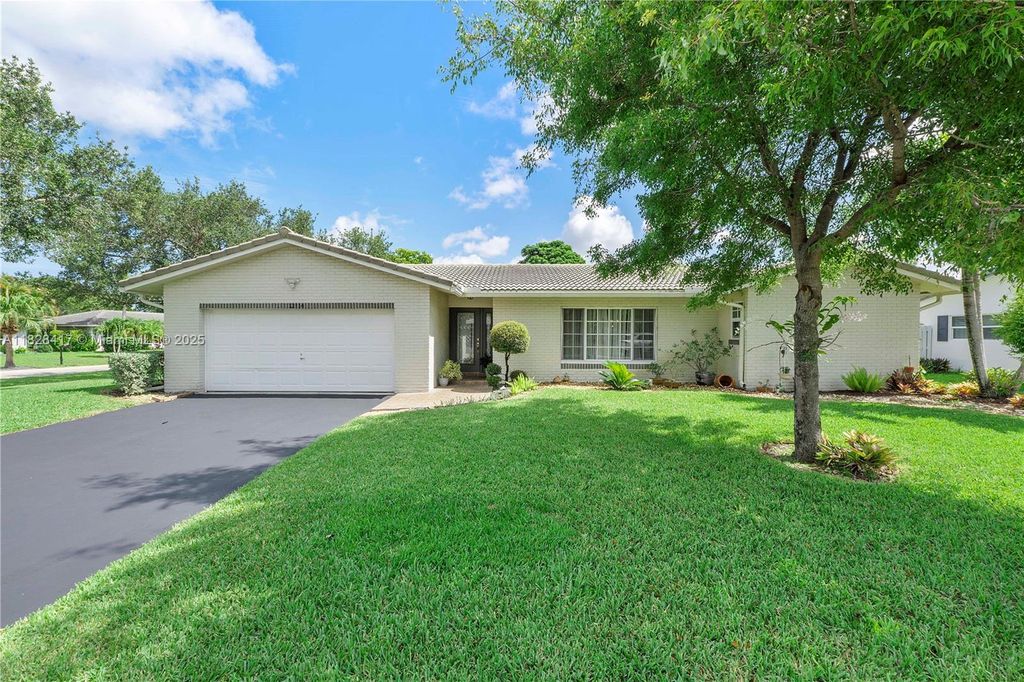 Photo of 12114 NW 27th Dr, Coral Springs, FL 33065 (MLS # A11828417)