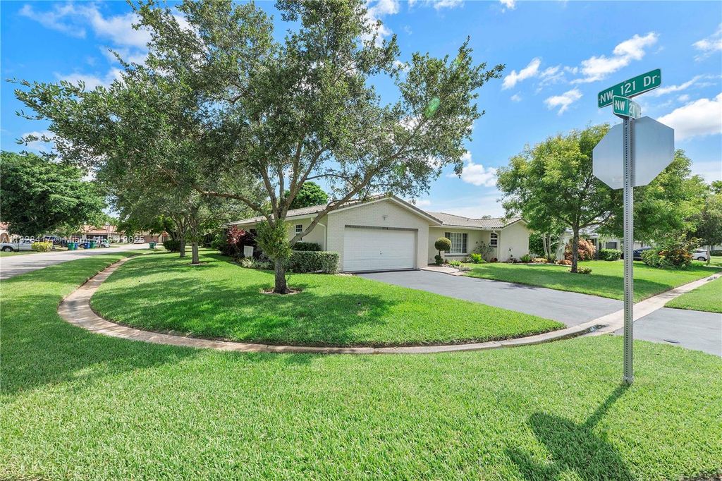 Photo of 12114 NW 27th Dr, Coral Springs, FL 33065 (MLS # A11828417)