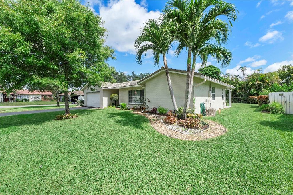 Photo of 12114 NW 27th Dr, Coral Springs, FL 33065 (MLS # A11828417)