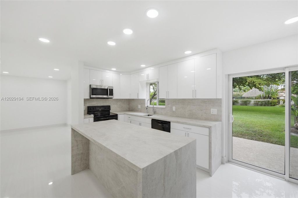 Photo of 22384 Thousand Pines Ln, Boca Raton, FL 33428 (MLS # A12029194)