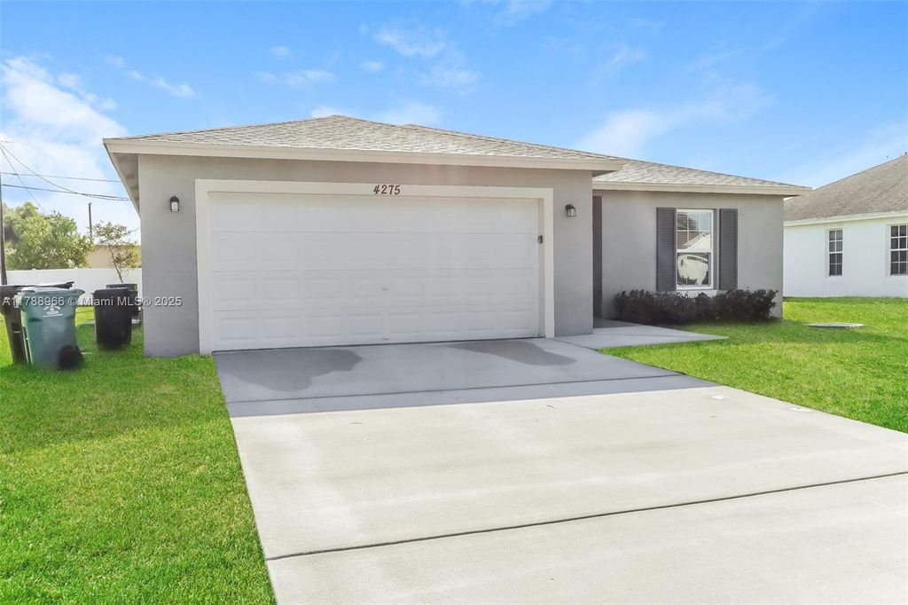Photo of 4275 SW Utterback St, Port Saint Lucie, FL 34953 (MLS # A11788966)