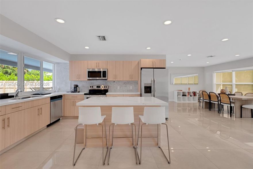 Rare gem in the highly desirable Emerald Hills neighborhood of Hollywood. This stylish, spacious, and light-filled home offers a split floor plan with 4 bedrooms, 2 full baths, and 1 half bath. Enjoy formal living and dining rooms, a Florida room, pool, patio, and back porch—perfect for entertaining. Completely turn-key with a new roof, new A/C, new kitchen with stainless-steel appliances, new water heater, impact windows and doors, new garage door, updated indoor and outdoor flooring, modern lighting, and more. Located in a quiet, family-friendly community close to highways, shopping, dining, and beaches. A must-see—fall in love today.