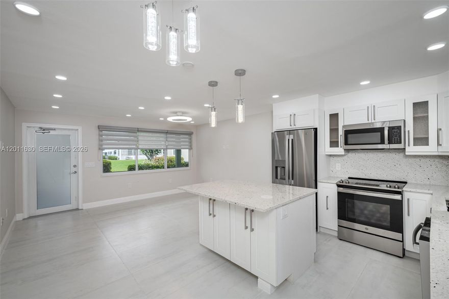 This community is perfect for active 55+ residents only! Thoughtfully remodeled, modern, light and bright firstfloor apartment! Beautiful, brand new kitchen withgranite counter, SS appliences, impact windows, and door, tilethroughtout, extended bedroom, central AC, tankless water heater, curbless shower, built in cabinets, zebrashades, remote fansrecessed lights and much more! Welcome to Century Village, Deerfield Beach's Active 55+adults gated community. Features: clubhouse, with indoor &outdoor pools, live shows, fitness center, tenniscourts, shuffleboard, volleyball, bocca ball, pickle ball. Convinient in-house bus transportation to local malls,shopping centers and medical facilities. Close to the Beach, restaurants, and shops and more.