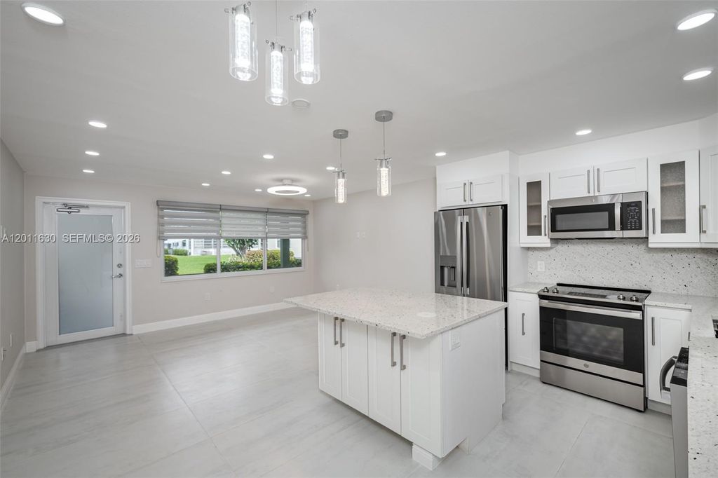 Photo of 102 E Upminster E #102, Deerfield Beach, FL 33442 (MLS # A12011630)