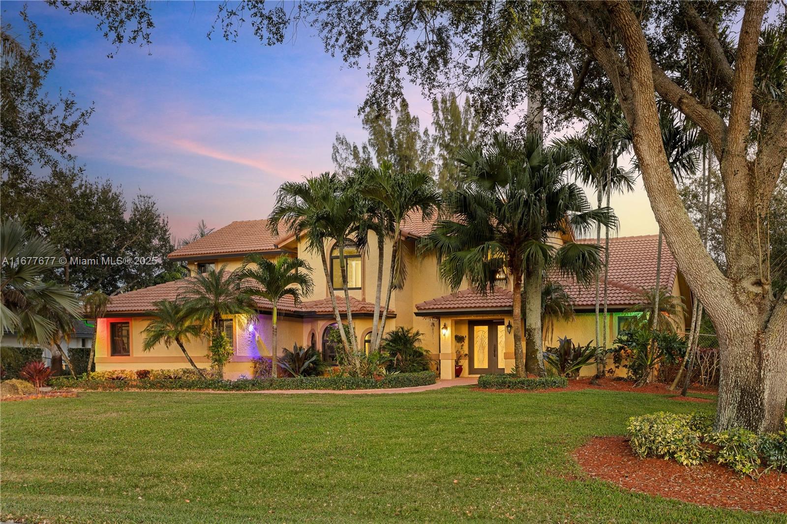 This pristine 5,129 sq. ft. executive home offers 4 bedrooms, 4 baths, and a host of luxurious features on a builder’s long acre in a peaceful cul-de-sac. The saltwater pool, dome-screened for year-round enjoyment, and the entire home are powered by solar panels, keeping electric bills at just $55/month. The fully fenced yard ensures privacy, while impact windows, doors, and a 3-zone A/C provide comfort and security. Inside, enjoy stainless steel appliances, granite countertops, soft-close cabinets, a marble fireplace, crown molding, designer murals, and more. Just blocks from the #1 ranked American Heritage School, this property is the epitome of style and convenience.