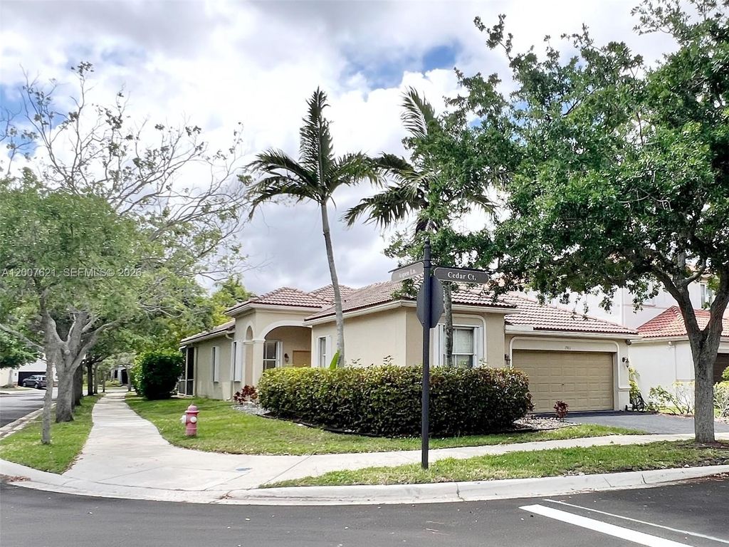 Photo of 1901 Cedar Ct, Weston, FL 33327 (MLS # A12007621)