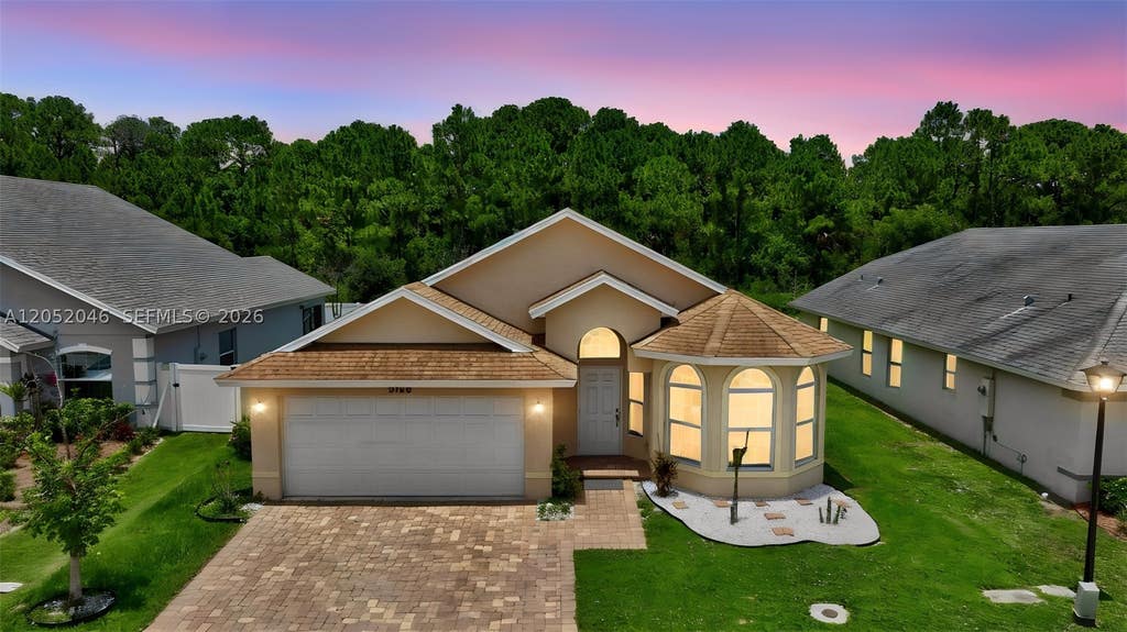 Photo of 9760 Palm Breezes Dr, Fort Pierce, FL 34945 (MLS # A12052046)