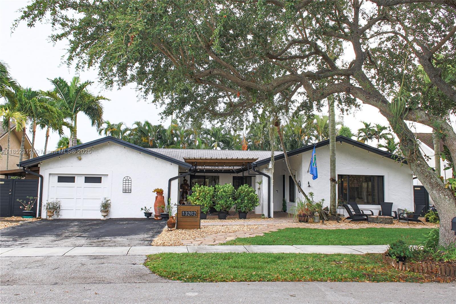 HIGHLY DESIRABLE CALUSA CLUB ESTATES!! Come see this beautiful, impeccable, one-story home featuring a spacious, covered open porch entrance, 4 bedrooms, 2 bathrooms, den, family room, utility room, high impact doors and windows, newly and tastefully remodeled bathrooms, large primary bedroom with his an hers closets with cabinetry. (Living area square footage larger than tax roll, per Sellers). Enjoy a piece of paradise in your private backyard with a beautiful pool area, including a stylish covered pergola sitting area, offering a place to relax beneath the cool comfort of shade. Great for entertaining and family gatherings! Excellent schools. Close to shops, restaurants, public transportation. So much more to offer!!! No HOA! Don't miss the opportunity to make this home your own!!