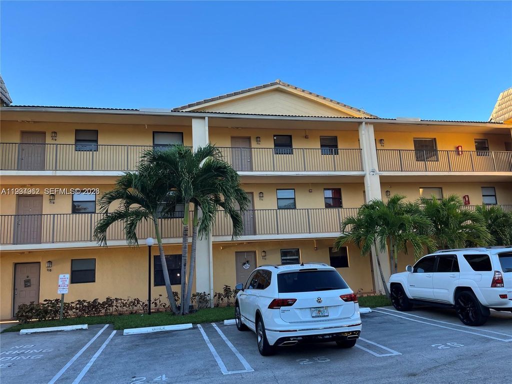 Photo of 11453 NW 39th Ct #210-2, Coral Springs, FL 33065 (MLS # A11934962)