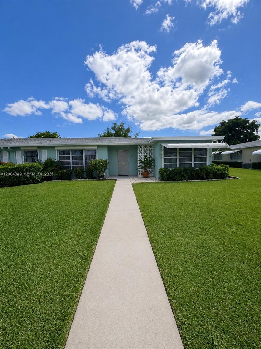 Welcome to this bright and beautifully updated 2-bedroom, 2-bath corner villa with a den in High Point of Delray. Offered fully furnished, this move-in-ready residence is ideal as either a primary home or a seasonal retreat. The spacious living area features durable vinyl flooring and updated trim throughout, creating a clean and modern feel. The renovated kitchen offers both style and functionality, perfect for everyday living and entertaining. Enjoy additional living space in the enclosed and raised Florida room, along with the versatility of a den, ideal for a home office, guest area, or cozy retreat.