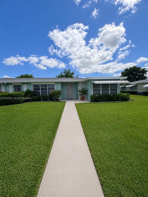 Photo of 200 High Point Ct E #D, Delray Beach, FL 33445 (MLS # A12004349)