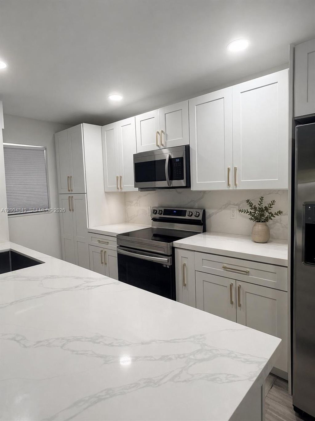 Photo of 200 High Point Ct E #D, Delray Beach, FL 33445 (MLS # A12004349)