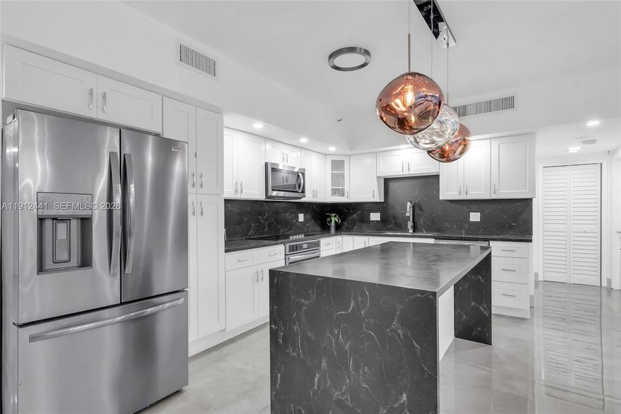 Live on a private, guarded island in Sunny Isles at Poinciana Island Yacht & Racquet Club—just 190 residences. This upgraded 3 bed, 2.5 bath corner penthouse features private elevator entry, a chef’s kitchen, and 3 terraces (888 SF) with stunning Intracoastal and ocean views. Enjoy your own outdoor hot tub and seamless indoor-outdoor living. Amenities include a clubhouse, 4 tennis courts, 2 pools, basketball court, gym, and beach access across the street. Minutes from Oleta River State Park and Haulover Beach. Rare opportunity!