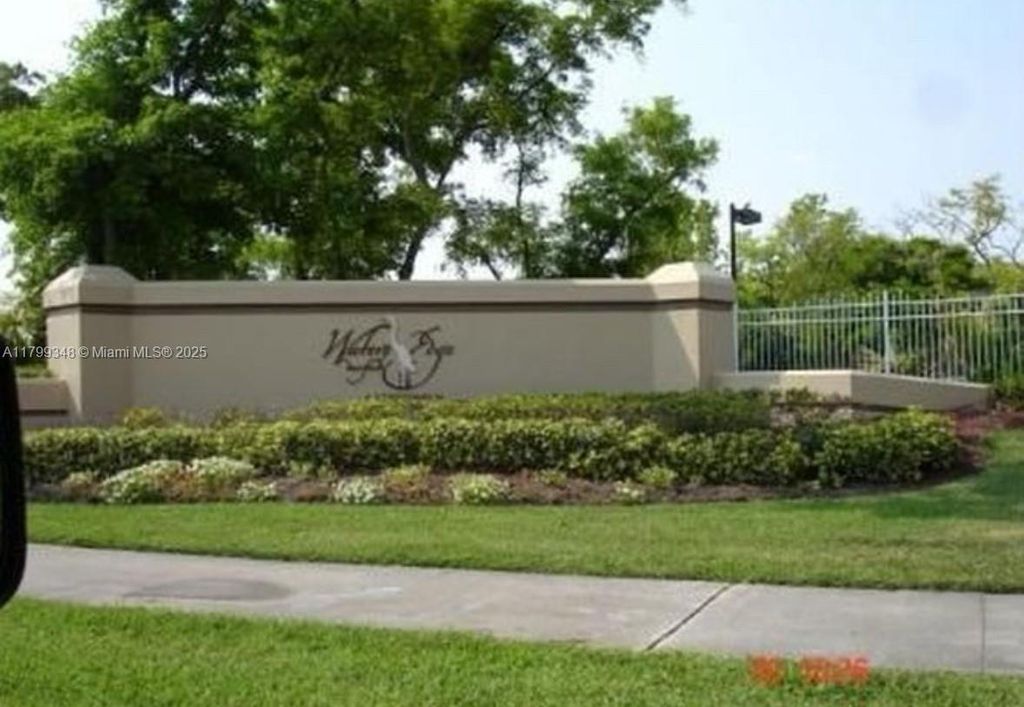 Photo of 640 Cypress Club Way #E12, Deerfield Beach, FL 33064 (MLS # A11799348)