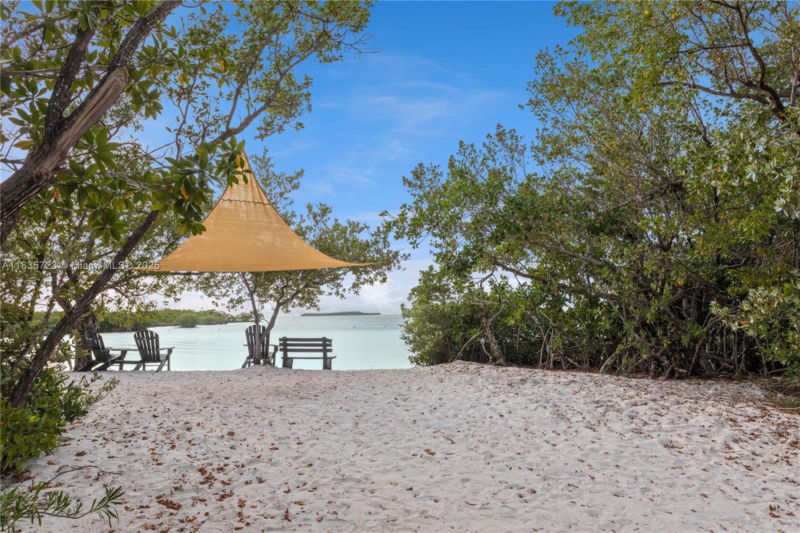 This super-cute and well-maintained 2/1 home comes with access to a private, gated bayfront park. Boaters will love the boat ramp, plenty of space to park your truck and trailer, and a private sandy beach just for homeowners and long-term tenants. The house has been nicely updated with a new kitchen and an outdoor kitchen. You’re just minutes from Tavernier, Islamorada’s Tiki Bar, gas stations, restaurants, supermarkets, marinas, parks—basically everything you need for the perfect getaway. See you at sunset! Nothing beats the breathtaking sunsets at Bay Haven in Key Largo—this spot is all about island living.