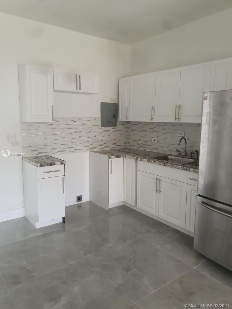 the unit has been refresh painted, also replace kitchen cabinet