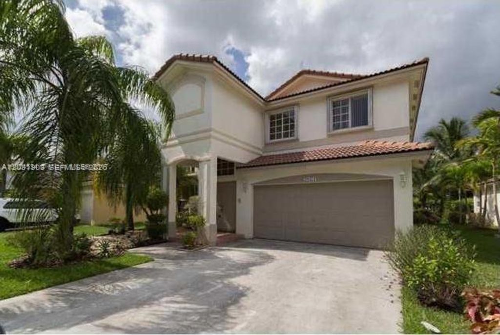 Photo of 20471 SW 1st St, Pembroke Pines, FL 33029 (MLS # A12001903)