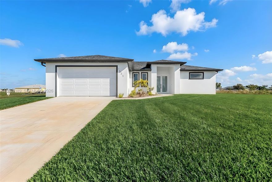 New Construction Home in Desirable Cape Coral! This beautifully designed single-family residence features a split-bedroom floor plan with 3 bedrooms, a den, 2 full bathrooms, plus a half bath on the lanai; ideal for a future pool. Situated on a rare triple corner lot with a freshwater canal, the home offers a 2-car garage, lanai, and premium upgrades throughout. Highlights include quartz countertops, modern white cabinetry, stainless steel appliances, tile flooring, glass showers, high ceilings, luxury tall interior doors, impact-resistant windows and doors, and a washer and dryer included. Conveniently located near top-rated schools, shopping, dining, BJ’s, Super Target, and Lowe’s. (Motivated seller as well as closing cost assistance available).