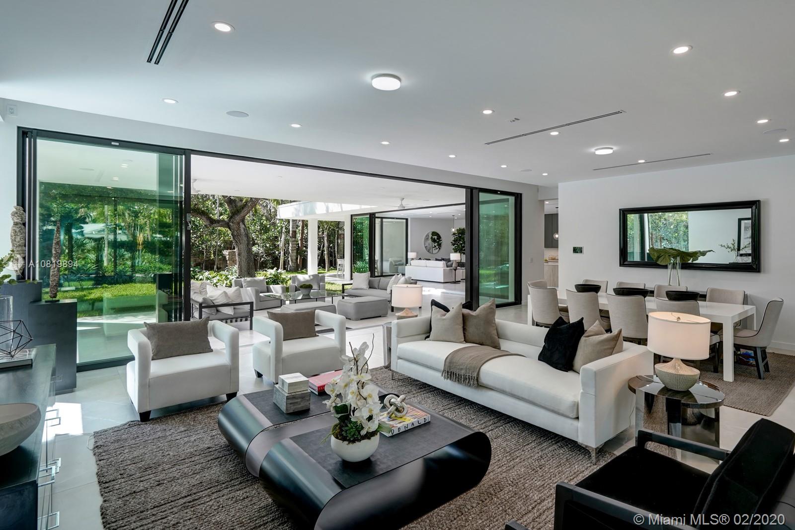 The design of this home embraces the garden setting its in. The minute you walk through the front door, it feels like you are in a beautiful garden setting. All glass exterior facing the garden and a seemliness flow from all areas inside to outside. Modern yet warm design and perfectly balanced use of space and land. Situated in the desirable gated Four way estates community, in south grove off the bay. Walking distance to the center of the Grove where a total transformation is taking place making the Grove more desirable than ever. Here you can live the ultimate lifestyle in Miami, walk to the local cafe and enjoy peace and tranquility in a stunning setting at home.