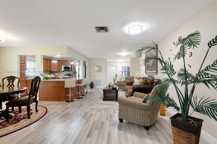Best Deal in Delray Villas! Fully & Truly OPEN CONCEPT beautifully renovated corner villa in a sought-after 55+ community—move-in ready with 2025 roof, 2020 A/C, and newer water heater. Enjoy 2023 impact windows & doors throughout. The villa also boasts smooth ceilings, fresh paint, recently installed wood floors, and a bright open layout. Gourmet kitchen with granite counters, wood cabinetry, almost new stainless steel appliances, and recessed lighting. Both renovated bathrooms feature sleek walk-in showers. Spacious and bright Florida room, screened patio, screen porch,  garage with laundry, and a laundry sink area. Modern, stylish, and worry-free! Enjoy a newly updated clubhouse, heated pool, and top-tier amenities. Safe, peaceful, and close to everything. Don’t miss this rare gem!