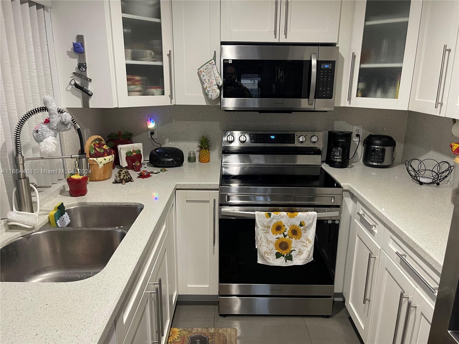 Located in a sought-after Miami-Dade neighborhood, this fully remodeled townhouse is a must-see. The home is move-in ready and offers a sleek, modern design. Just minutes from major highways and shopping centers, it’s perfectly situated for convenience. The gated community offers a variety of amenities, including pools, tennis and basketball courts, parks, and a clubhouse for gatherings. The property features impact windows, in-unit washer/dryer, and comes with 2 assigned parking spaces. Cable, internet, and roof maintenance are included in the HOA, offering worry-free living in a vibrant setting.