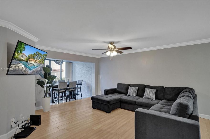 Spacious two bedroom, two bathroom first floor villa with a garage in the gated community of Emerald Oaks. This single-story home is tastefully remodeled with stainless steel appliances, quartz counters, tile flooring, and modern window finishings. The pool and guest parking area are close to the unit, and there are walking trails in the community. Located directly across the street from TY Park, close to grocers, shopping, Hard Rock and I-95.