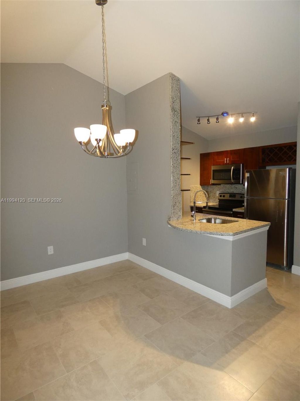 Photo of 2851 N Oakland Forest Dr #309, Oakland Park, FL 33309 (MLS # A11994120)