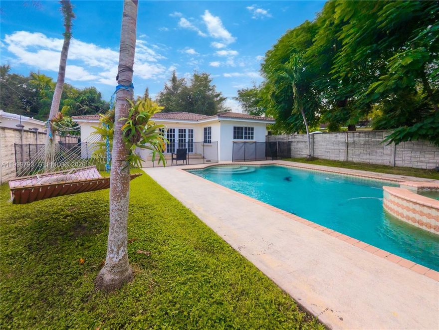 **Private Resort-Style Pool Home — 3BD / 2BA** Step into your own Miami oasis ?? This beautifully maintained three-bedroom, two-bathroom home delivers true indoor-outdoor living with a **resort-style backyard** featuring a **heated pool and jacuzzi** — perfect for relaxing days and unforgettable nights. Enjoy **maximum privacy** with a full perimeter gate and **remote gate entry**. The property offers a **large off-street front parking area**, ideal for multiple vehicles, guests, or toys. Inside, you’ll find bright, comfortable living spaces designed for everyday ease and entertaining. Outside, it feels like a private retreat — quiet, secure, and move-in ready. A rare find for buyers who want space, privacy, and that Miami lifestyle all in one