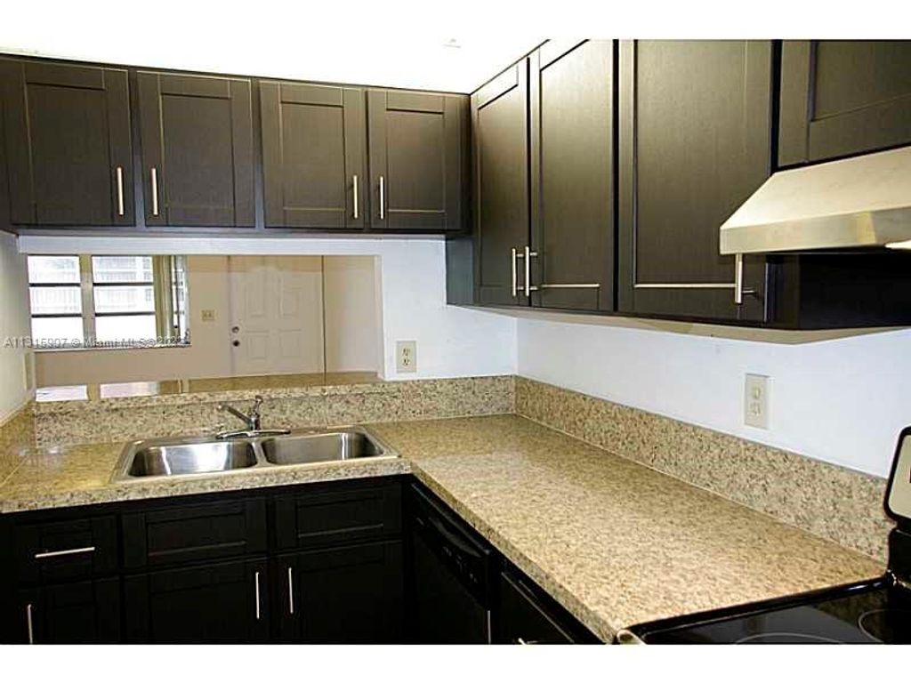 Photo of 1032 Twin Lakes Dr #21-G, Coral Springs, FL 33071 (MLS # A11315907)