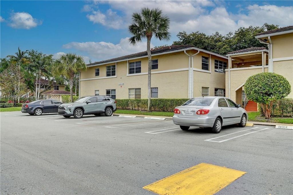 Photo of 1032 Twin Lakes Dr #21-G, Coral Springs, FL 33071 (MLS # A11315907)