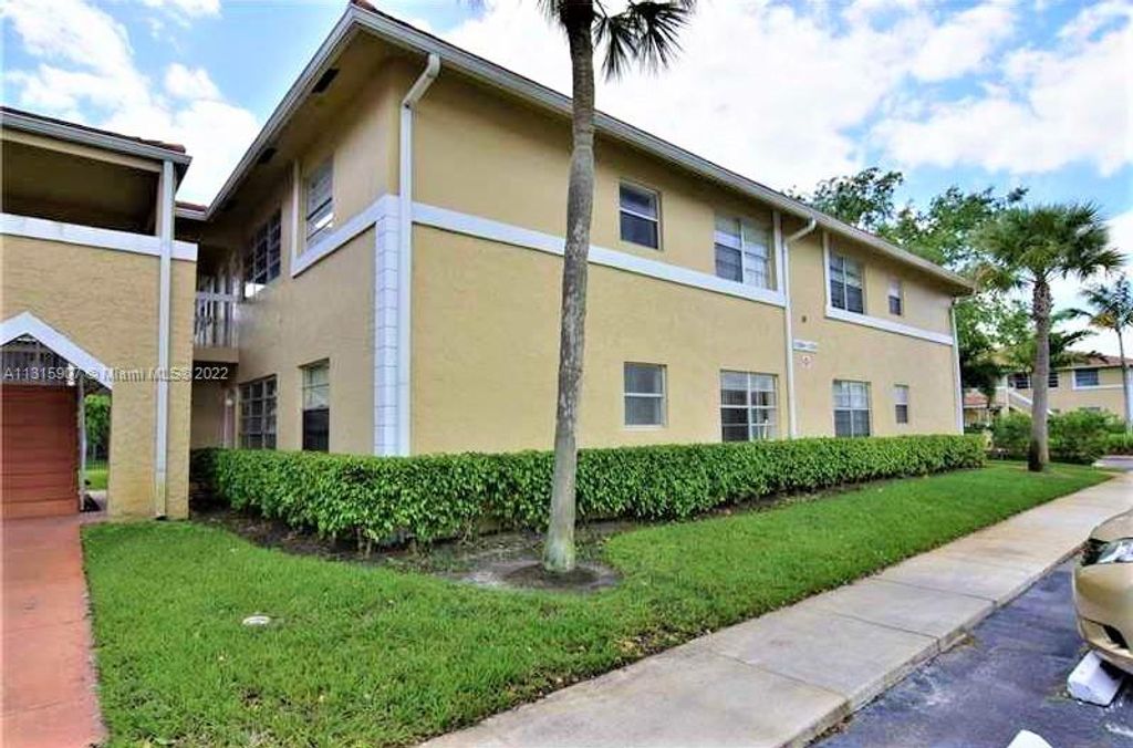 Photo of 1032 Twin Lakes Dr #21-G, Coral Springs, FL 33071 (MLS # A11315907)