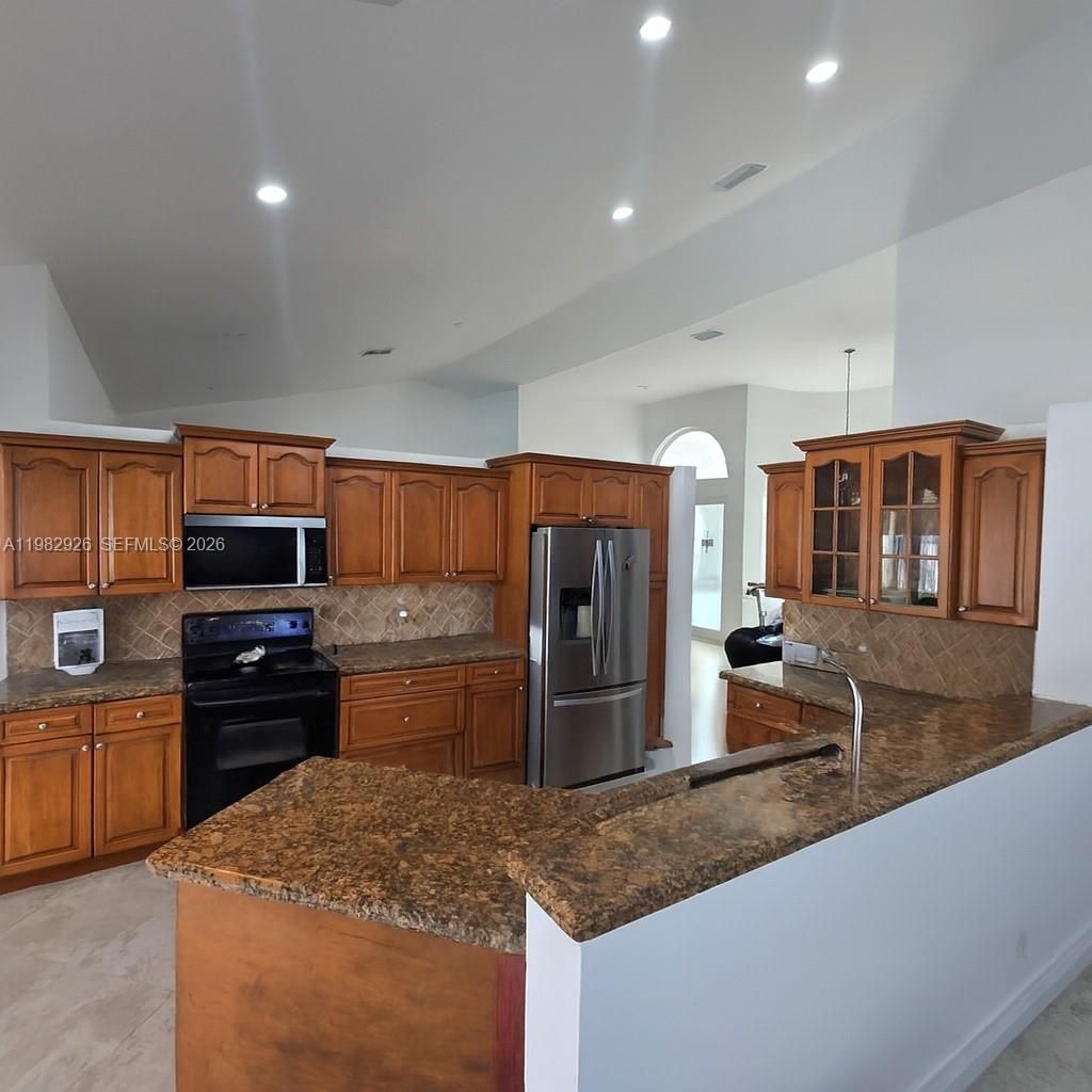 Photo of 1583 NW 182nd Way, Pembroke Pines, FL 33029 (MLS # A11982926)